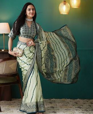 Green printed brasso casual saree with blouse piece 5