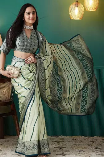 Green printed brasso casual saree with blouse piece
