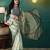 Green printed brasso casual saree with blouse piece