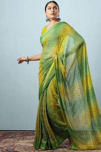 Green elegant printed georgette saree with blouse piece