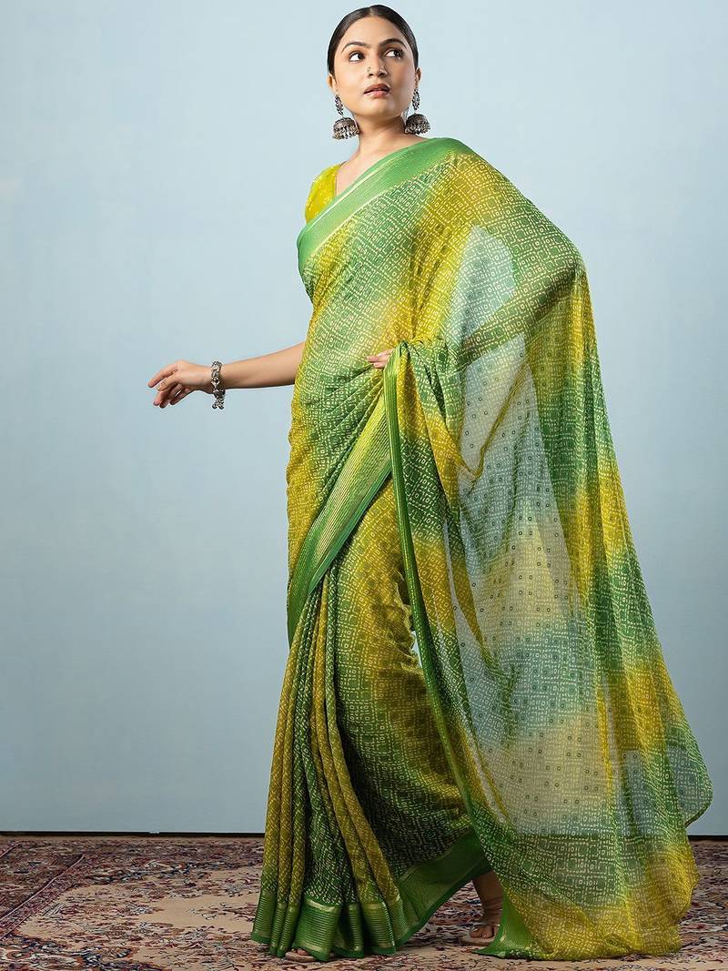 Green elegant printed georgette saree with blouse piece