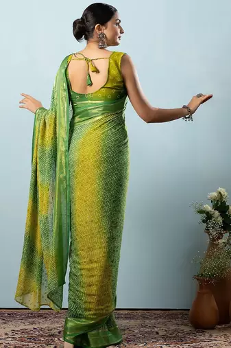 Green elegant printed georgette saree with blouse piece