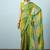 Green elegant printed georgette saree with blouse piece