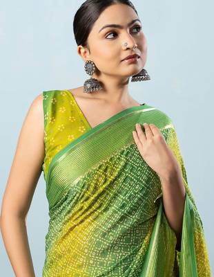 Green elegant printed georgette saree with blouse piece 5