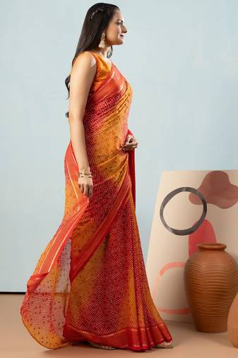 Red elegant printed georgette saree with blouse piece