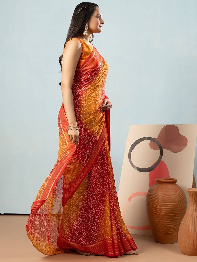 Red elegant printed georgette saree with blouse piece