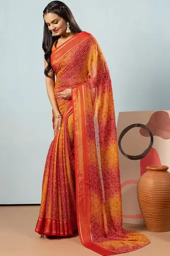 Red elegant printed georgette saree with blouse piece