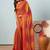 Red elegant printed georgette saree with blouse piece
