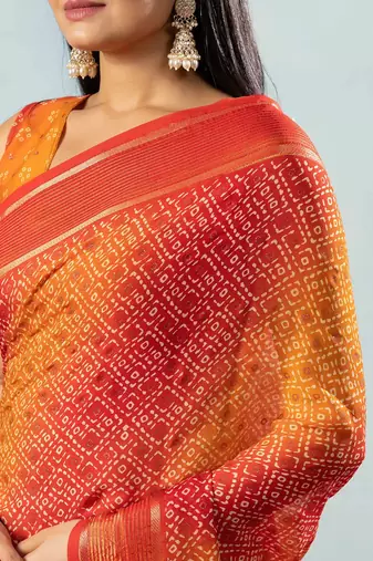 Red elegant printed georgette saree with blouse piece