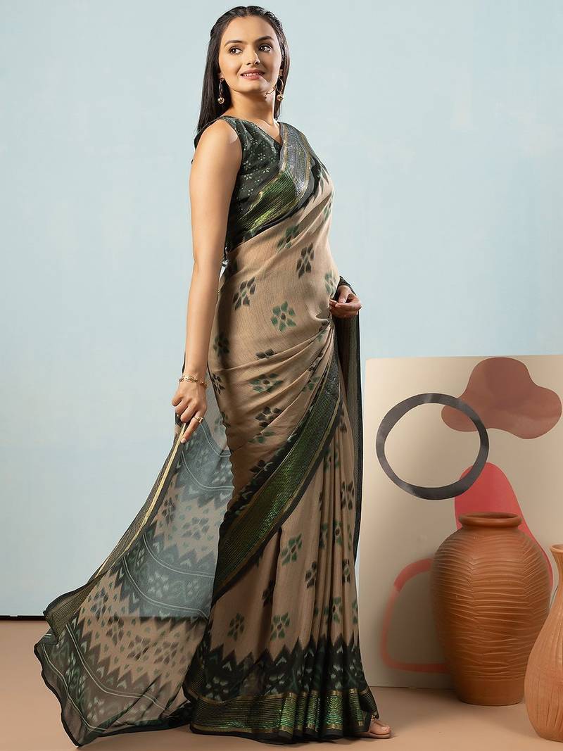 Green elegant printed georgette saree with blouse piece