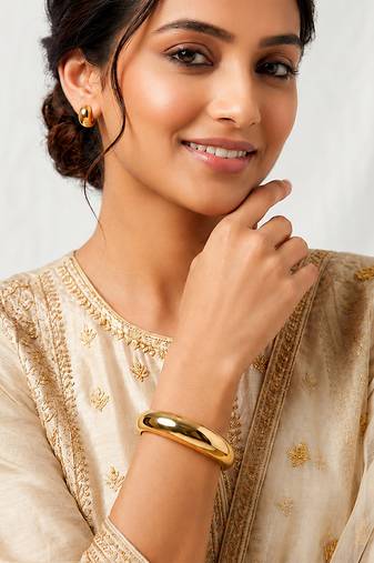 Gold metallic hinged bangle