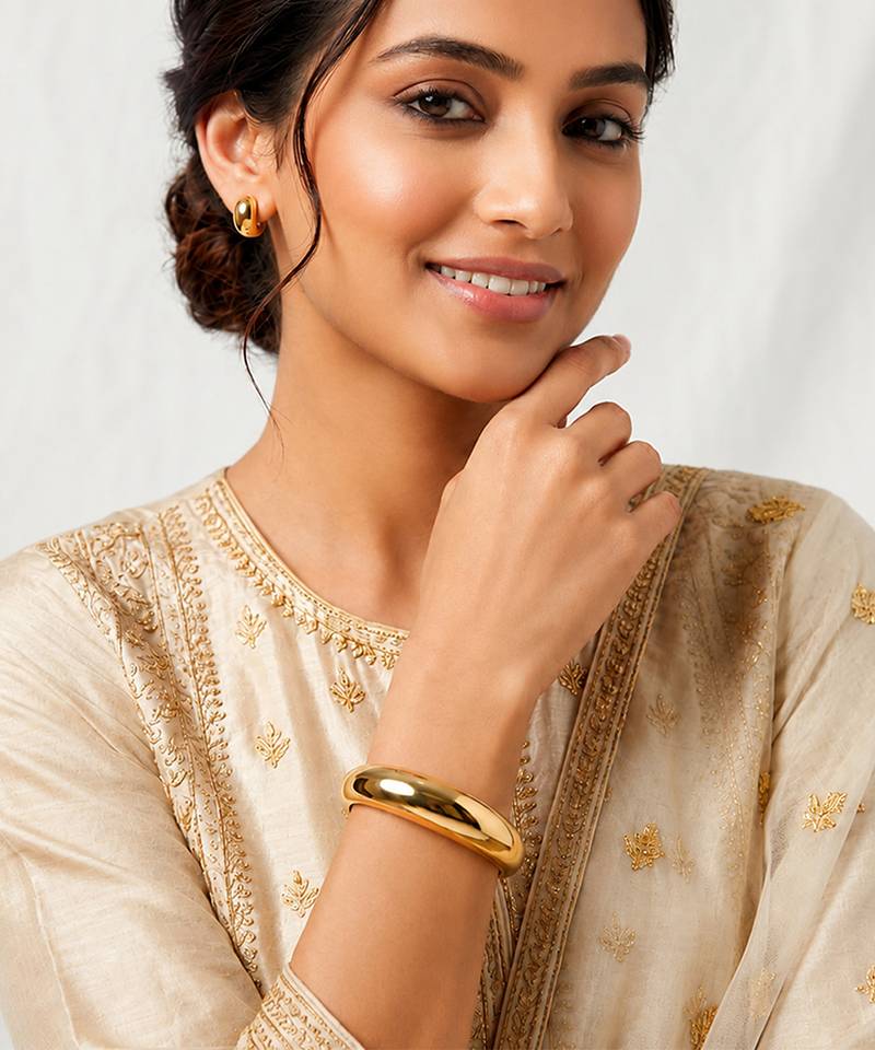 Gold metallic hinged bangle