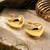 Metallic gold high polish huggie hoops earrings
