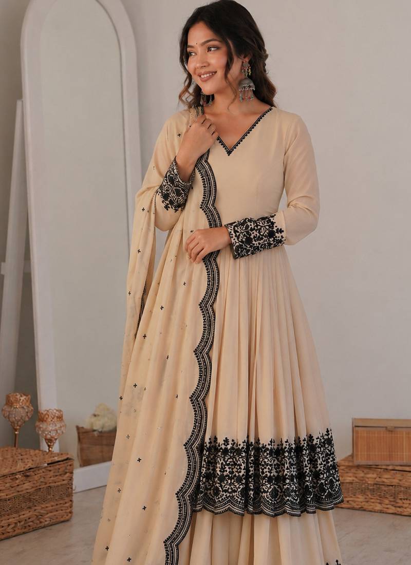 Cream georgette thread embroidered plazzo suit