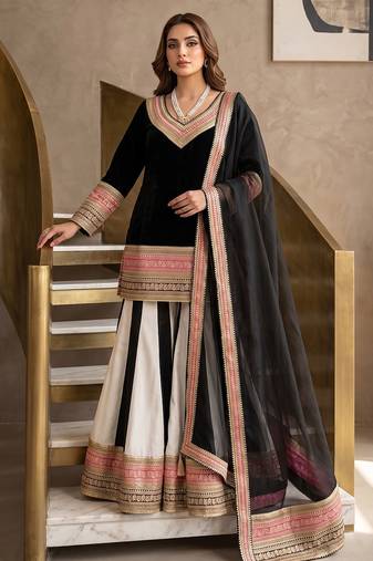 Elegant black sharara suit with heavy embroidered border dupatta