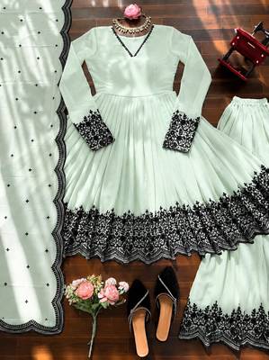 Pastel mint green georgette thread embroidered plazzo suit 4