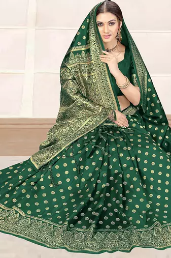 Dark Green woven banarasi silk blend saree with blouse
