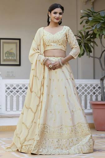 Beige embroidered lehenga choli with dupatta
