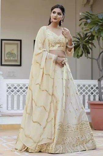 Beige embroidered lehenga choli with dupatta