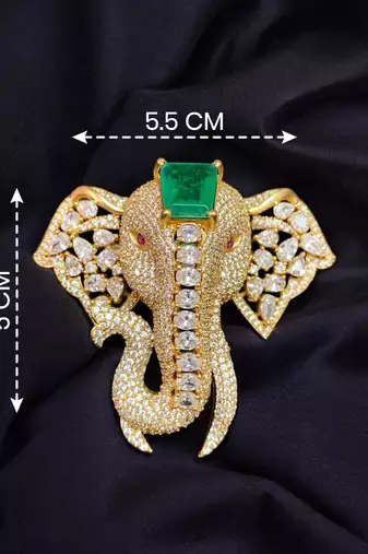 Royal elephant designer brooch with green emerald-cut crystal & american diamond stones | gold-plated statement brooch