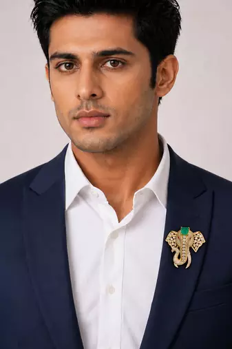 Royal elephant designer brooch with green emerald-cut crystal & american diamond stones | gold-plated statement brooch