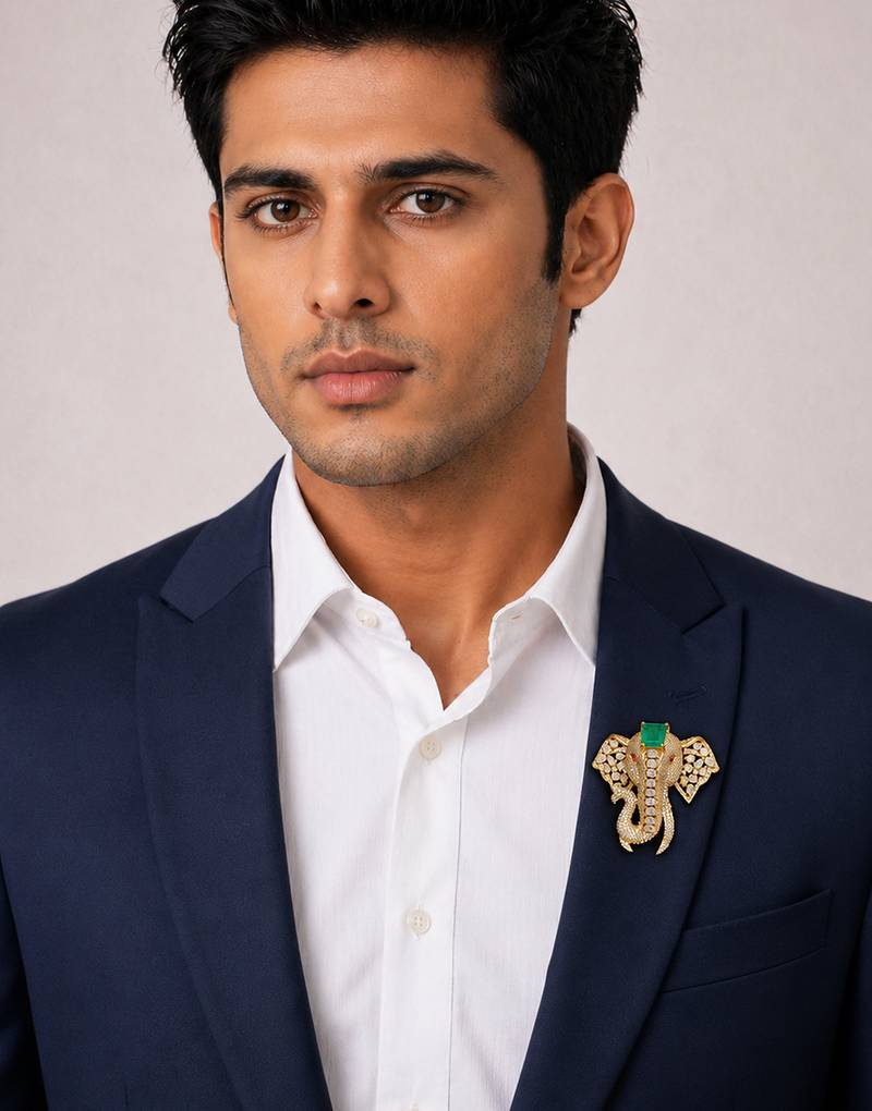 Royal elephant designer brooch with green emerald-cut crystal & american diamond stones | gold-plated statement brooch