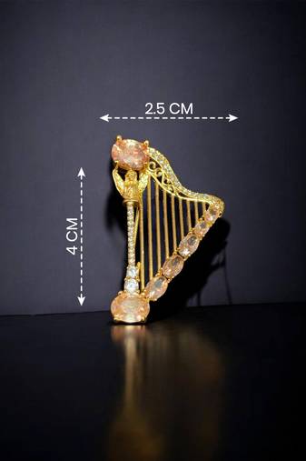 Elegant harp design crystal brooch with peach champagne stones | gold-plated musical instrument brooch pin