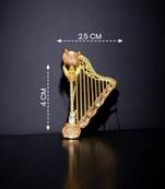 Elegant harp design crystal brooch with peach champagne stones | gold-plated musical instrument brooch pin