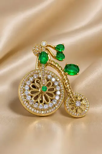 Designer bicycle brooch with emerald green crystal stones & american diamonds | gold-plated vintage cycle brooch pin