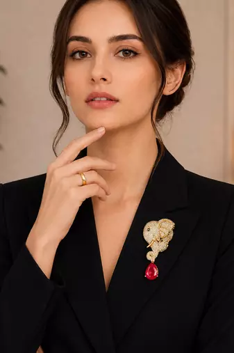 Royal elephant head designer brooch with ruby red teardrop crystal | gold-plated luxury statement brooch pin
