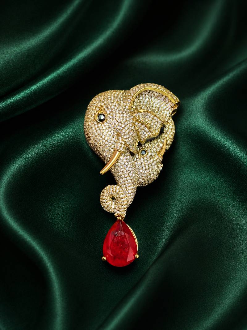 Royal elephant head designer brooch with ruby red teardrop crystal | gold-plated luxury statement brooch pin