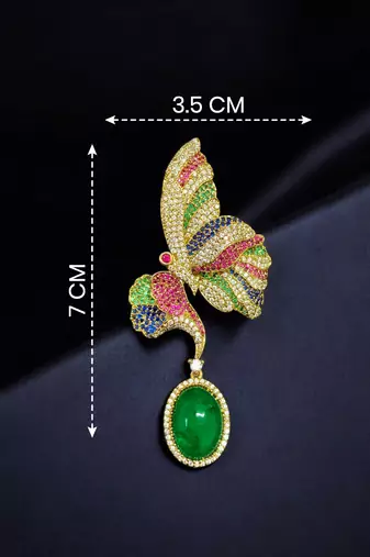 Designer multicolor butterfly brooch with green oval stone & american diamond embellishments