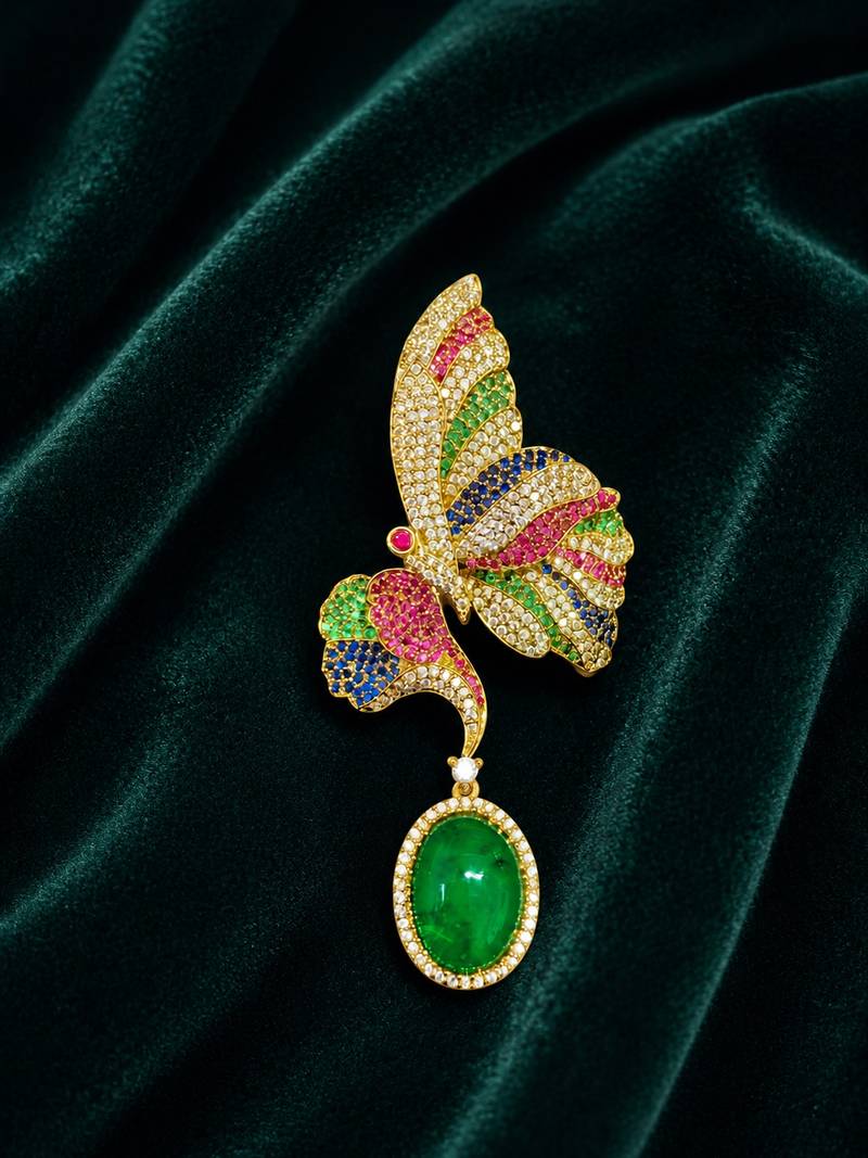 Designer multicolor butterfly brooch with green oval stone & american diamond embellishments
