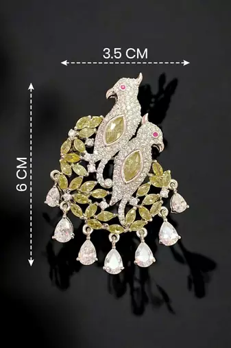 Elegant twin parrot designer brooch with yellow crystal leaves & dangling teardrop stones | brooch