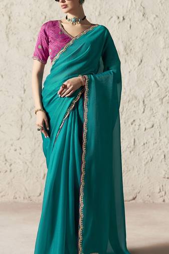 Teal embroidery work fancy fabric saree with blouse