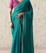 Teal embroidery work fancy fabric saree with blouse