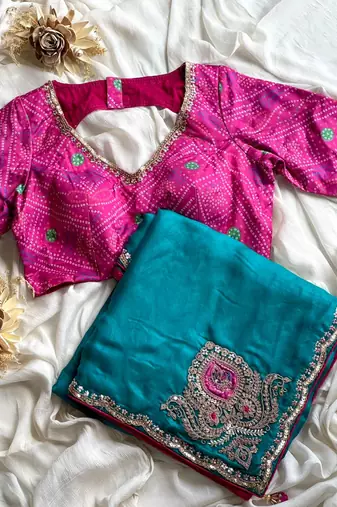 Teal embroidery work fancy fabric saree with blouse
