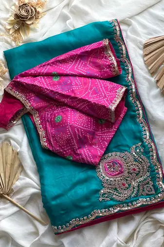Teal embroidery work fancy fabric saree with blouse
