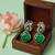 Silver plated green stone drop earrings