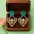Gold plated green stone earrings