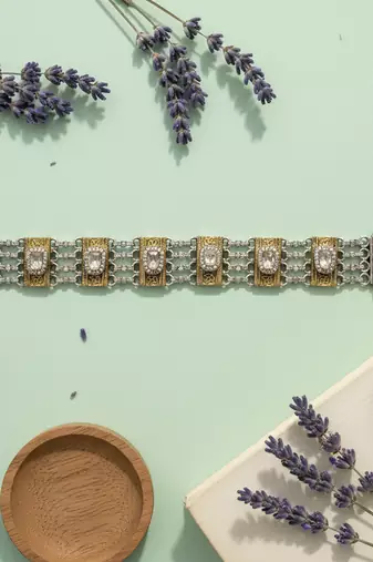 Dual tone white stone kundan bracelet