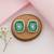 Silver plated green stone kundan stud earrings