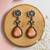 Silver plated orange peach stone dangler earrings