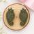 Gold plated green stone stud earrings
