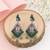 Silver plated green stone drop earrings