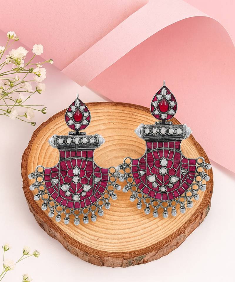 Silver plated pinkish red dangler earrings