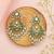 Silver plated green kundan dangler earrings
