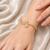 Gold-toned pearl floral kada bracelet with cz stones openable free size 