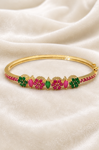 Gold-plated floral kada bracelet with ruby & emerald stones openable free size 