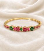 Gold-plated floral kada bracelet with ruby & emerald stones openable free size 